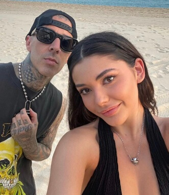 Alabama Luella Barker's father Travis Barker with his current wife Kourtney Kardashian